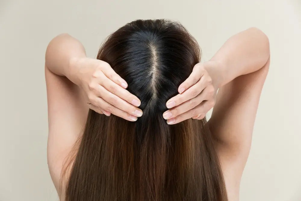 5 Not-So-Obvious Signs You're In Need of a Dry Scalp Treatment