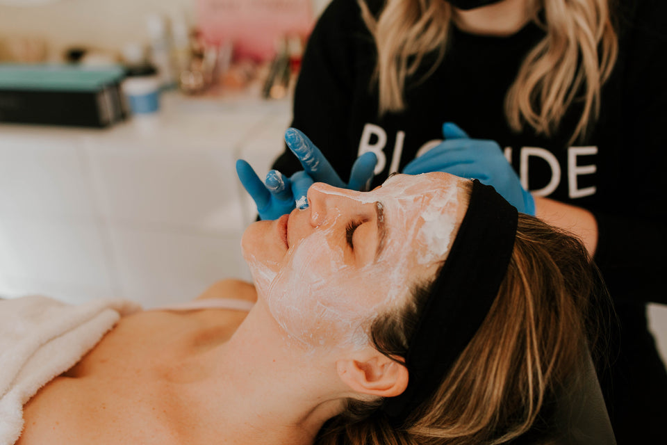 Woman undergoes skin care treatment at Flirt Cosmetics Studio Medical Spa